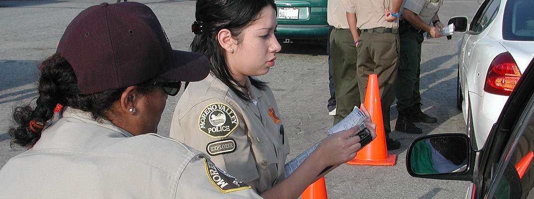 Police Explorers helping at at traffic stop. 