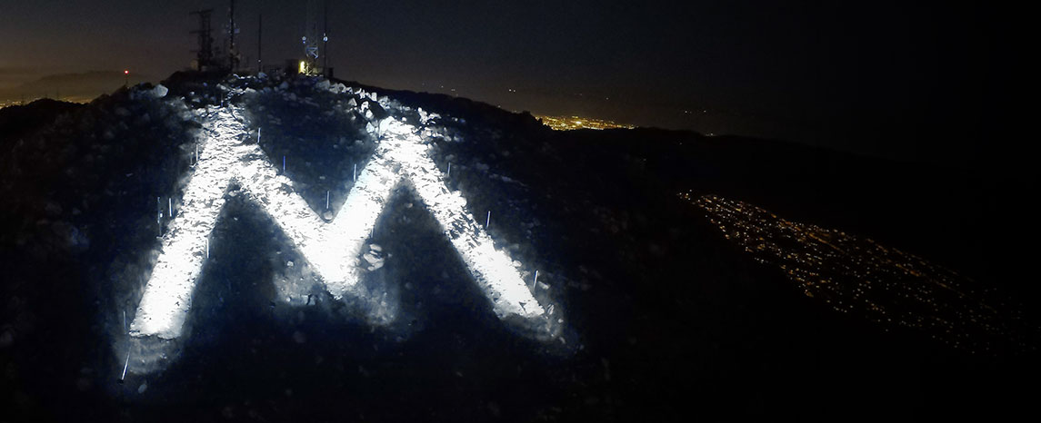 The M lit all white to honor unity