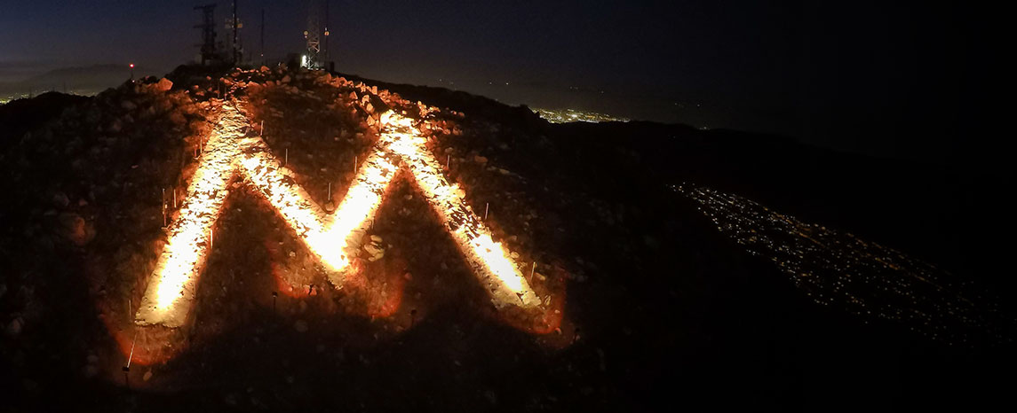 The M lit pink in recognition of a cause