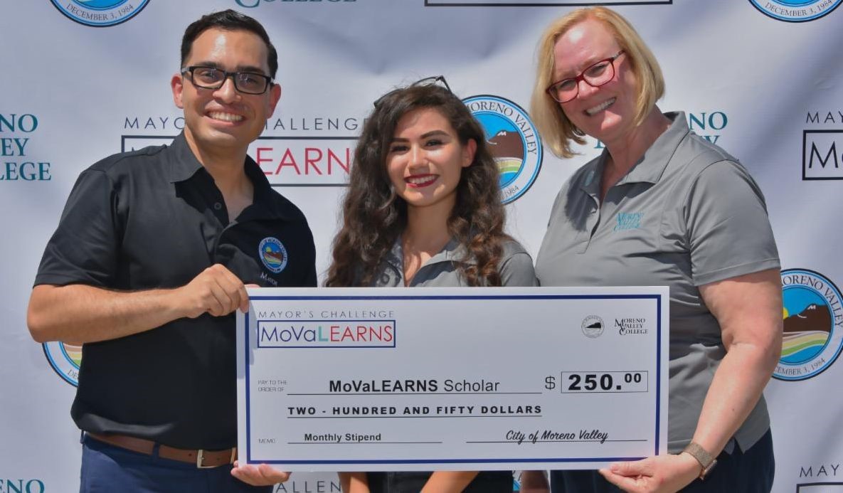 Mayor Gutierrez with City Staff and the award check.