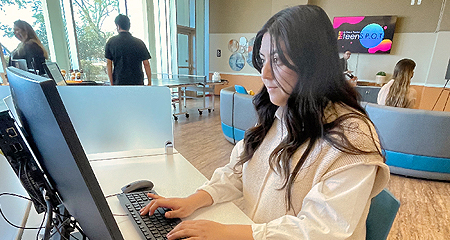 teen working on a computer